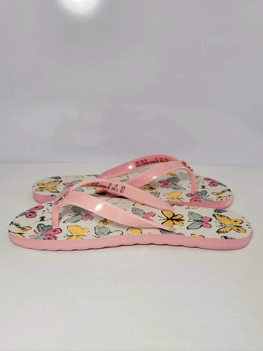 Coach Women's Size 8B  Zayn Pink Butterfly flip flops Slides.